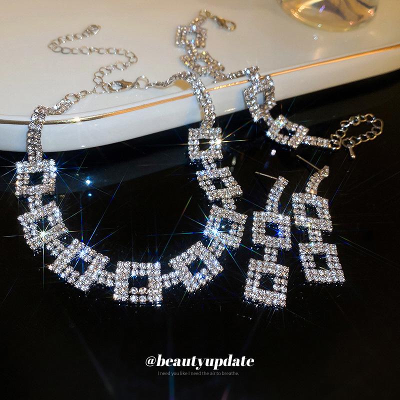 

Exquisite High-End Inlaid Diamond Necklace, Earrings & Bracelet Set for Women