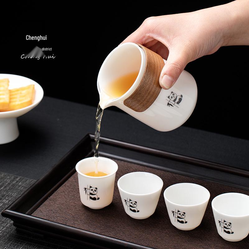 Premium Mutton Fat White Porcelain Panda Travel Tea Set - Portable Kung Fu Set with One Pot and Four Cups for Car, Outdoor, and Camping Use.