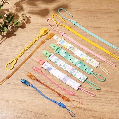 Silikonový řetízek na dudlík a kousátko pro miminka - Šňůrka proti pádu