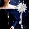 Collier à longue chaîne avec pendentif flocon de neige en strass pour femme