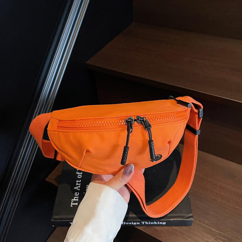 

New women s high-end sports shoulder cloth bag niche versatile messenger women s bag Japanese going out leisure small bag помаранчевий