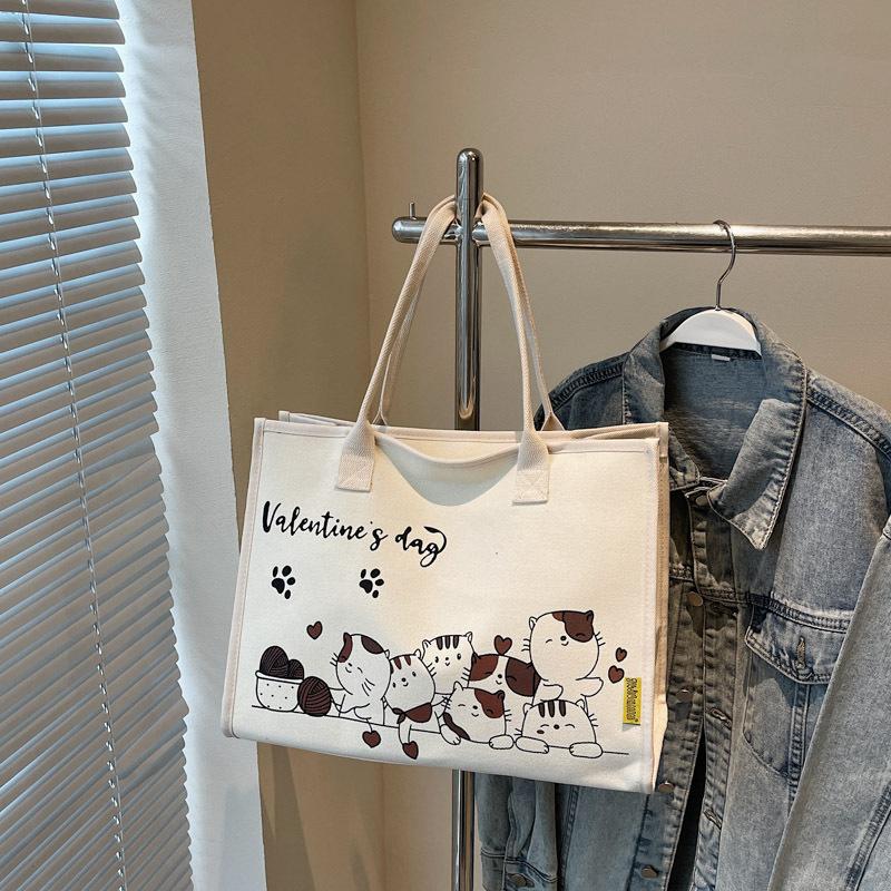 

Cute cartoon large-capacity canvas bag women s new casual shoulder bag class commuter tote bag