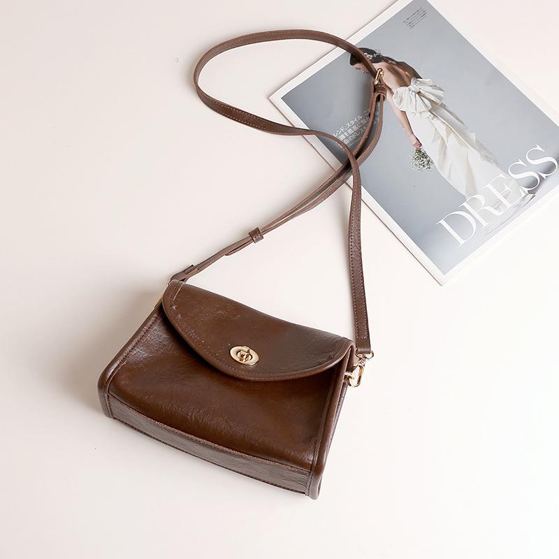 

Commute casual soft leather retro women s flip crossbody bags new versatile for work commuting shoulder bag solid color handbags 21x8x13cm кофейный