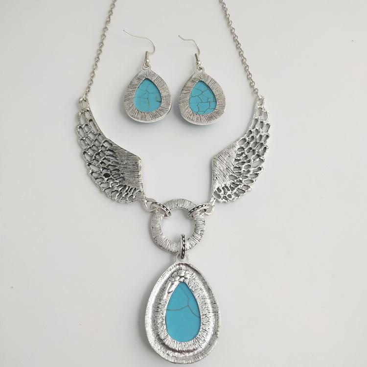 Schickes europäisch-amerikanisches Türkis-Flügel- & Wassertropfen-Halsketten-Ohrring-Set