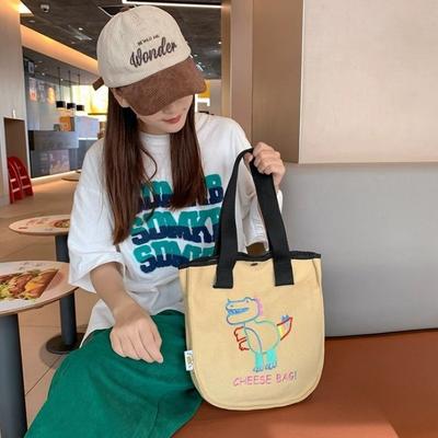 Sac en toile dinosaure dessin animé mignon sac femme broderie décontracté grande capacité sac fourre-tout sac fourre-tout étudiant