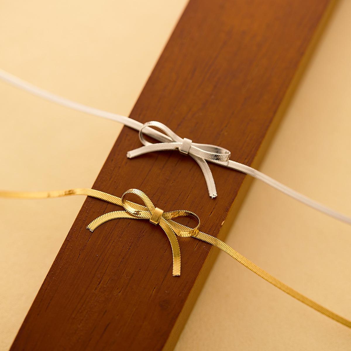 

Wenjian Personalized Snake Bone Choker Necklace - Fresh Titanium Steel Blade Chain, Real Gold Plating, Non-Fading.