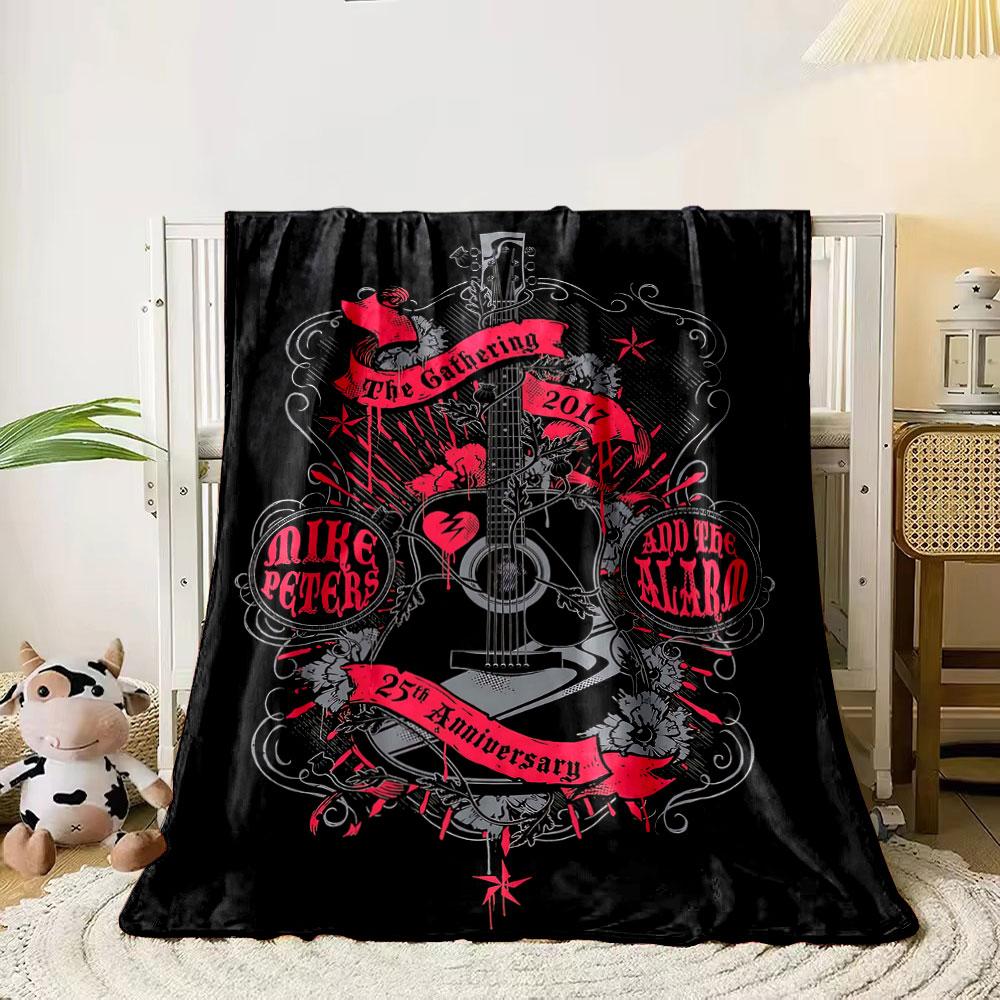 

Central guitar with red banners, floral accents, and decorative swirls. for all seasons blanket lunch break throw gift 80cm x 120cm