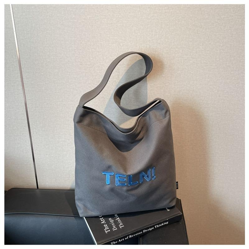 Canvas bag women's large-capacity new summer simple and versatile shoulder messenger bag college student tote bag