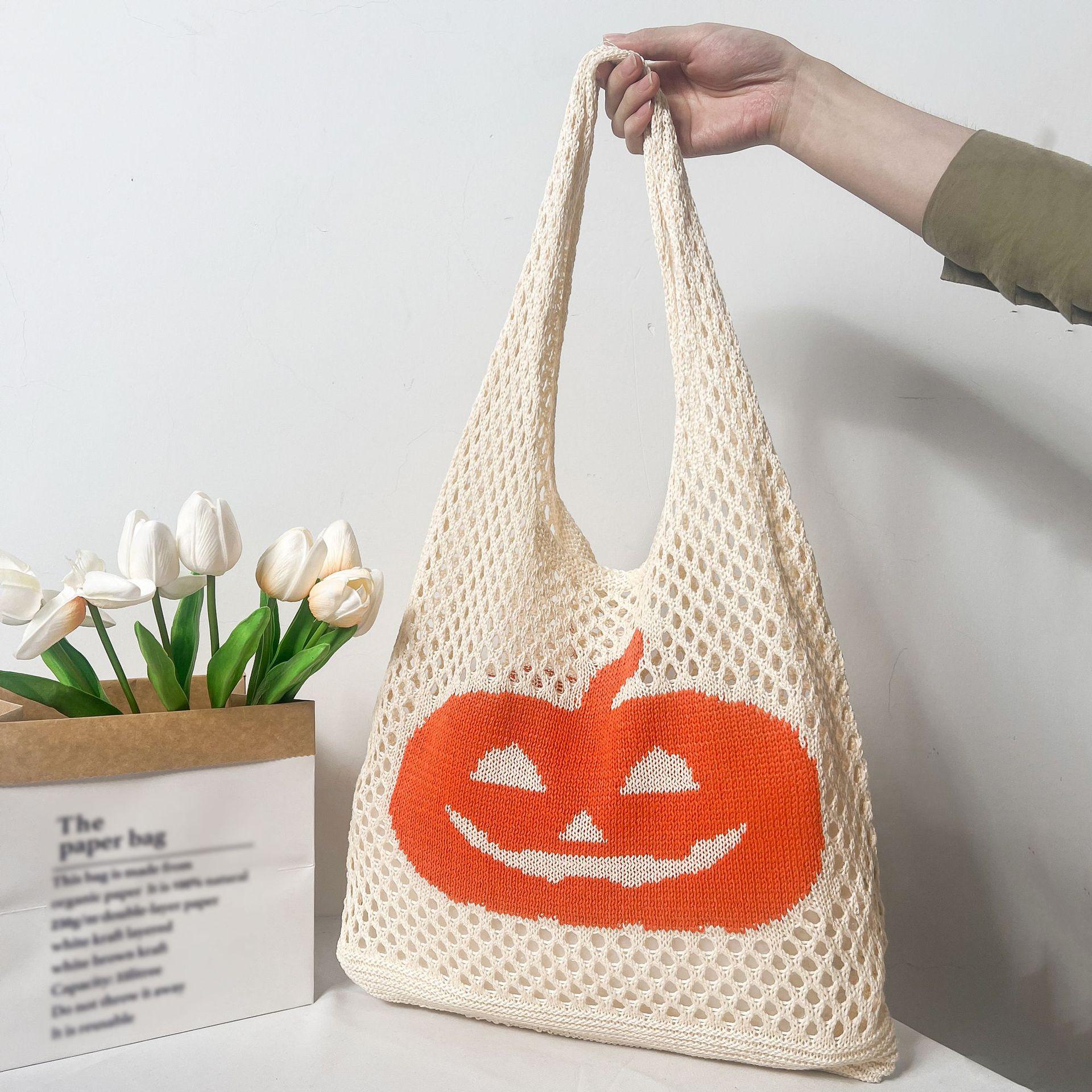 

Нова версія плетеної вовняної сумки, шикарна проста ретро-порожниста в’язана квіткова сумочка великої місткості. 48*33*1