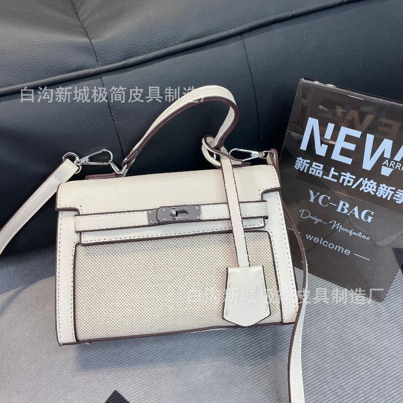 

Kelly portable platinum women s bag high-end sense new retro fashion woven second generation mini Kelly