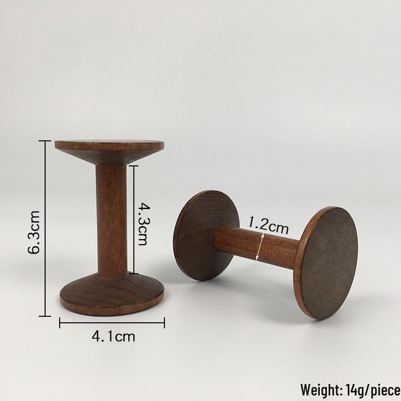 Retro Solid Wood Spool: Nostalgic Handmade Thread Organizer for Cross-Stitch and Crafting.