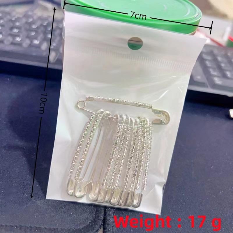 

Waist-Cinching Rhinestone Safety Pin: Women s Sweater Brooch & Anti-Exposure Accessory