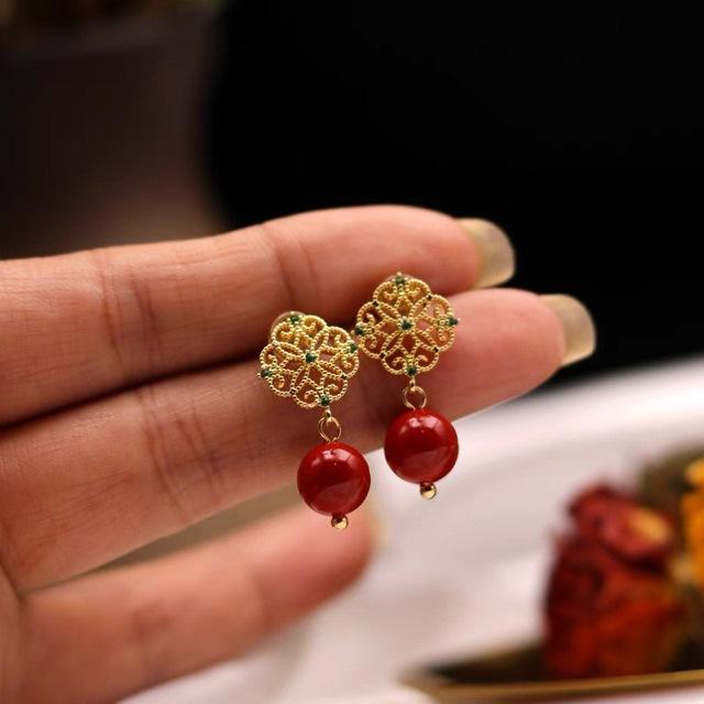 14K gold-wrapped hollow lace diamond stud earrings cinnabar red festive temperament high-end earrings earrings pendant earrings tide