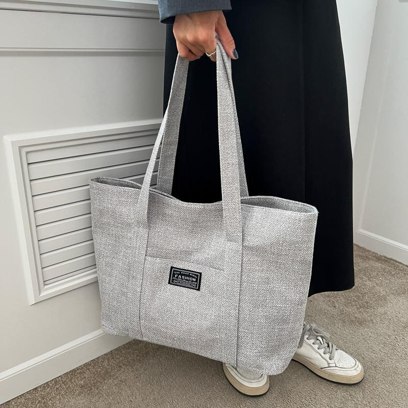 New women's shoulder tote bag, trendy and fashionable portable shopping bag, large and simple going out storage bag