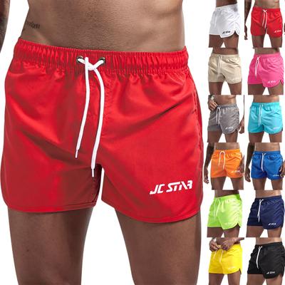 Pantaloni da spiaggia casual da spiaggia da uomo stampati impermeabili cinque pantaloni pantaloncini da bagno