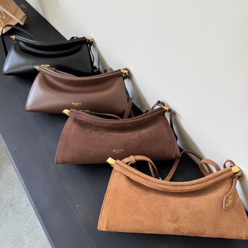 Französisches Nischendesign minimalistischer Stil Rindsleder Schulter Achseltasche Pendeln einfach Mode vielseitig Damenmode Baguette-Tasche