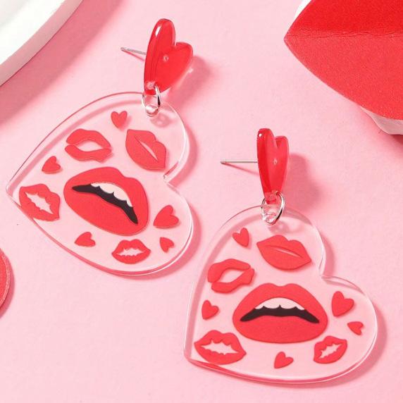 A pair of Valentine's Day acrylic red heart-shaped earrings, sweet personality red lips, niche trend women's earrings.