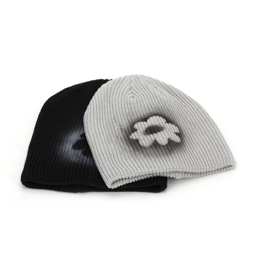 New solid color flower jacquard hat women's autumn and winter warm wool hat Internet celebrity windproof hat manufacturer knitted hat