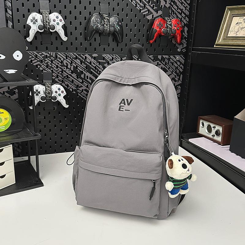 

Casual schoolbag female college student simple and versatile large-capacity backpack male junior high and high school student computer backpack trend single bag серый