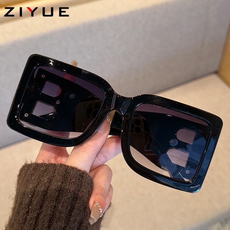 New box personalized sunglasses, women's high-end sense, big face and thin travel street shooting UV-proof sunglasses