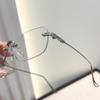 High-End Women's Rimless Blue Light Blocking Glasses - Fashionable Square Frame with Decorative Cut-Edge Design.