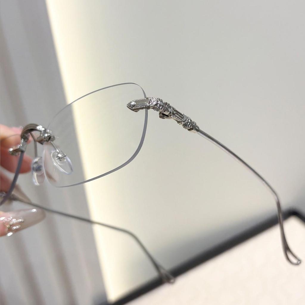 High-End Women's Rimless Blue Light Blocking Glasses - Fashionable Square Frame with Decorative Cut-Edge Design.