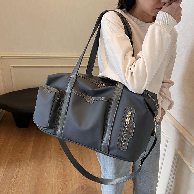 Women's outgoing travel bag Fashion large-capacity portable business trip duffel bag High value lightweight sports fitness bag Men's