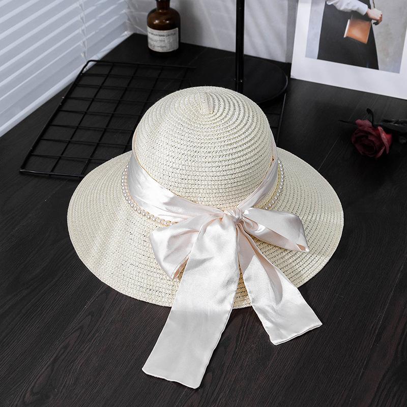Elegant Women's Sun Hat with Bow & Faux Pearl Accents - Breathable, Wide Brim Straw Bucket Cap for Summer