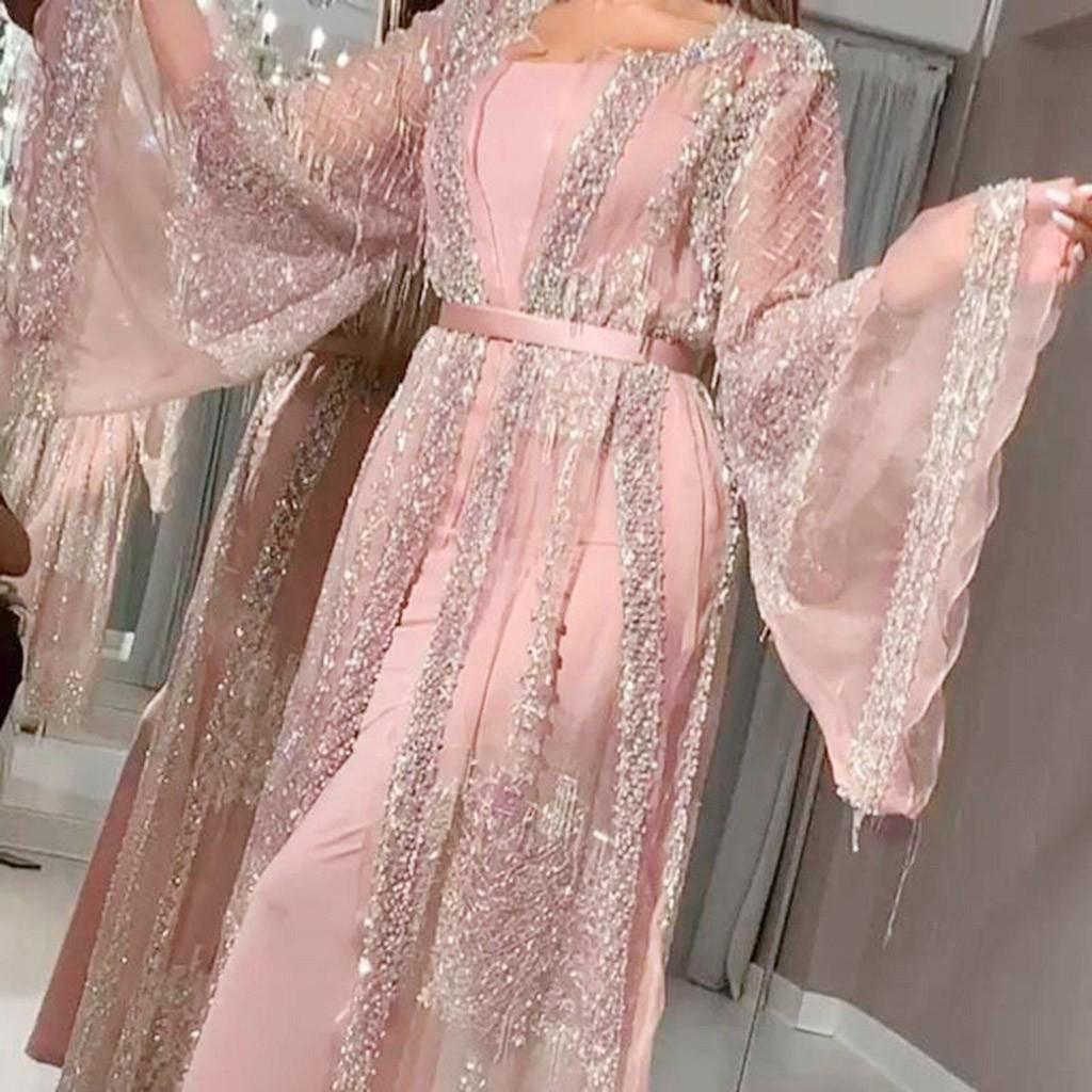 Abito lungo da donna in rete con paillettes a maniche lunghe. Abito lungo in due pezzi