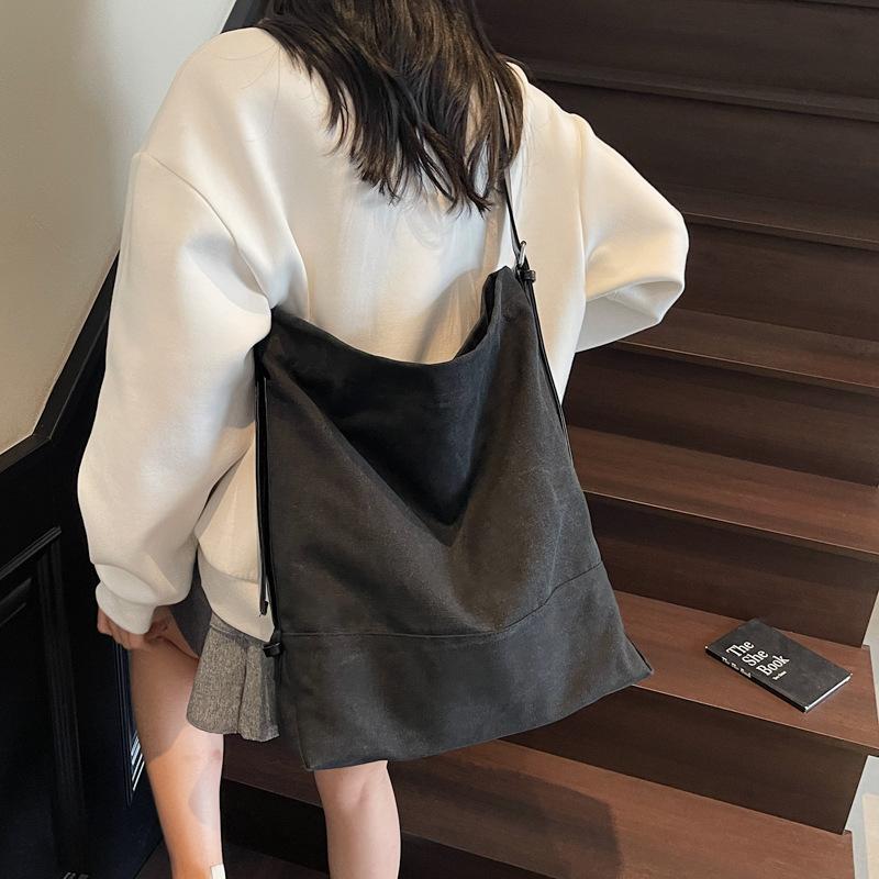 2025 new casual large-capacity canvas bag women's simple and fashionable tote bag Korean version commuter messenger bag bag
