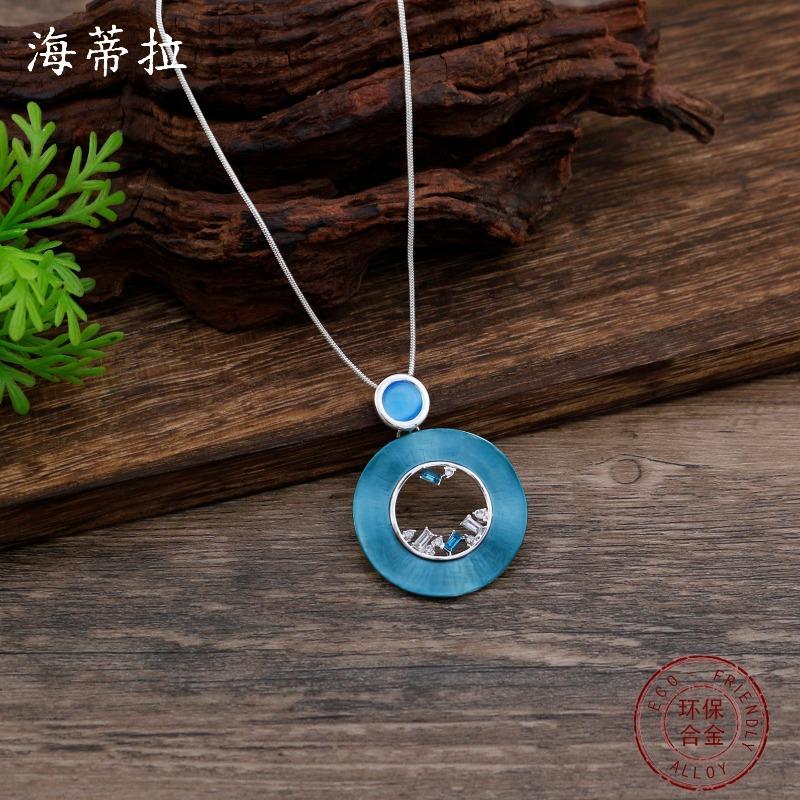 New enamel color hollow round stud earrings pendant set women's fashion high sense hollow ring necklace