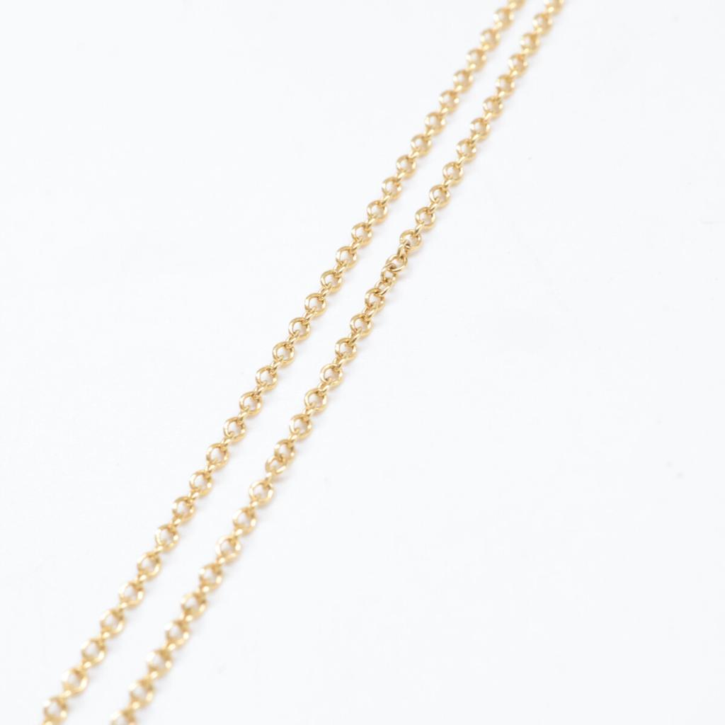 TIFFANY&Co. Au750 x SV925 Retour à TIFFANY & Co. Collier Marguerite Coccinelle Or jaune xArgentOccasion