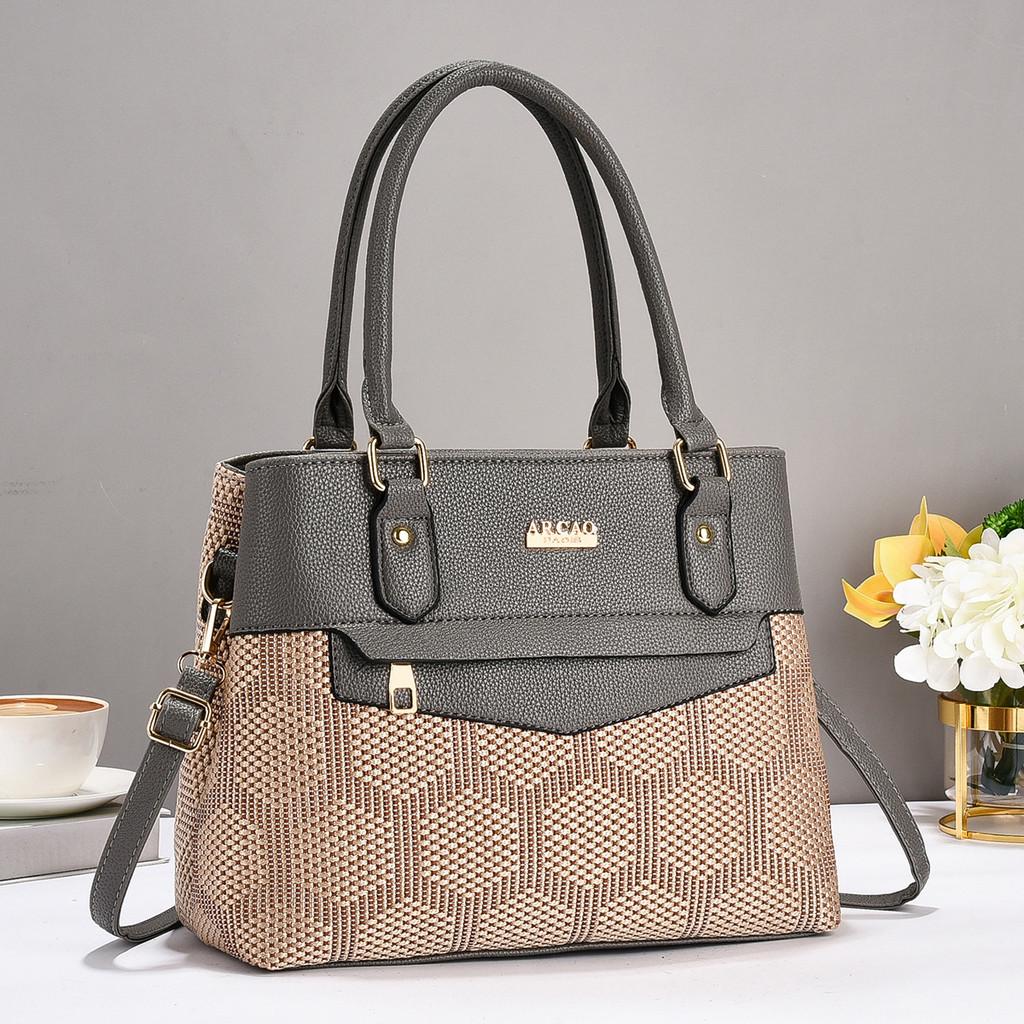 Stylish Women's Tote Bag In Elegant Black And Earthy Tones With Chic Design Features