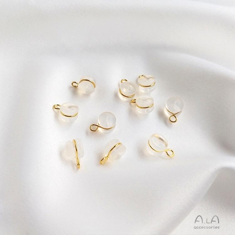 

Кольцо-восьмерка из золота и белого золота с подвеской и прозрачными силиконовыми стопперами для ушей - DIY аксессуары для ювелирных изделий.