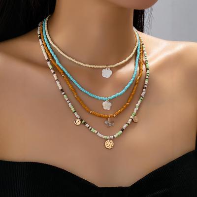 Ensemble de colliers ethniques rétro à perles: Bijoux pour femmes style forêt multicouche