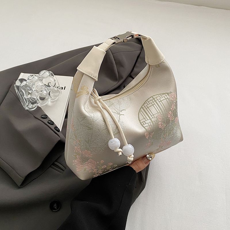 

Ручная переноска Новая китайская сумка-подмышка для женщин 2025 Лето Вышивка Нишевый стиль Модная плечевая сумка-мессенджер для женщин Beige White