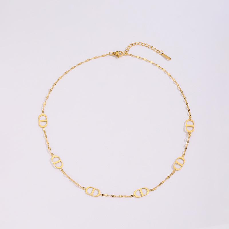 European & American Non-fading Plated 18K Gold Titanium Steel Hollow Pig Nose Necklace for Women.