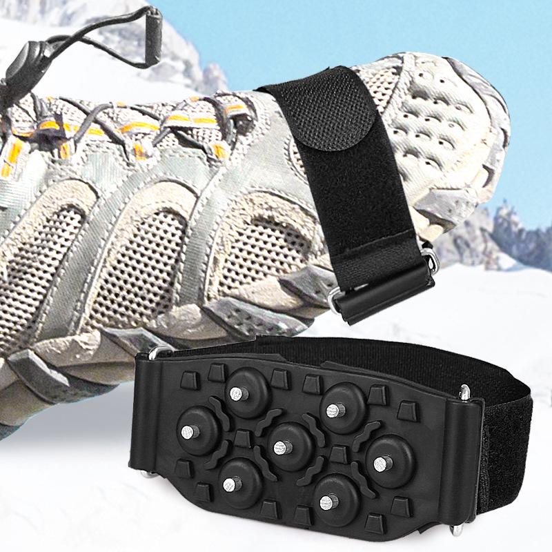 Adjustable Outdoor 7-Tooth Ice Cleats: Portable Anti-Slip Shoe Covers for Travel and Mountaineering.