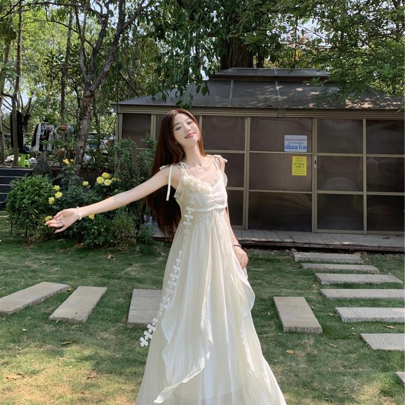 Holiday style flower design suspender dress women's 2026 summer new waist thin very fairy long skirt