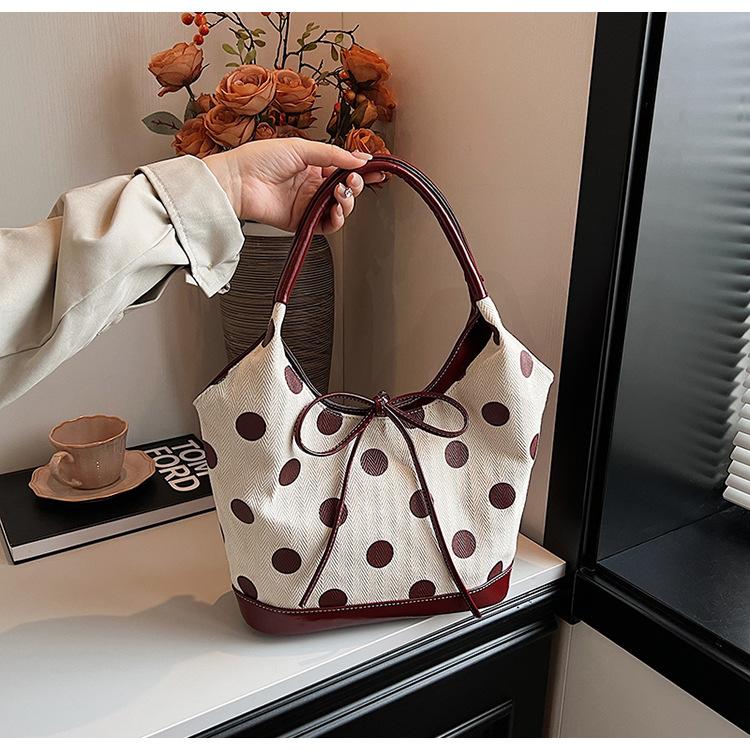 Hand carrying retro casual tote bag women's 2025 new Korean version trendy fashion polka dot underarm bag large capacity women's bag
