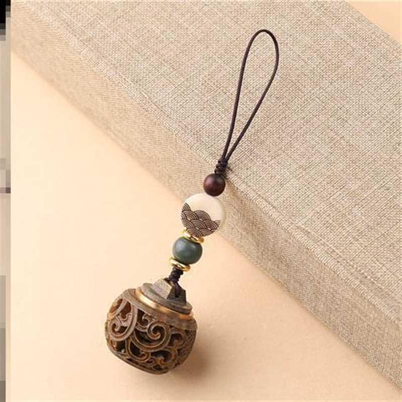 Green Sandalwood Sachet Ball: Ancient-Style Aromatherapy Pendant & Mobile Phone Lanyard with Opening Feature.