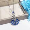 Fan Shaped Pendant Necklace with Deep Blue and Clear Stones Ornate Statement Jewelry for Women