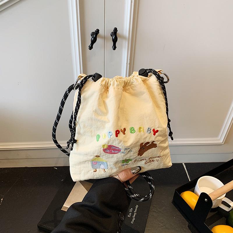 New nylon embroidered mobile phone bag fashionable versatile messenger bag simple drawstring canvas shoulder bag