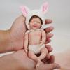 6 tums realistisk simuleringsdocka Solid mjuk silikon Återfödelsedocka April Mini Handlek Babydockor Dusch Byta kläder Docka Palm Leksak