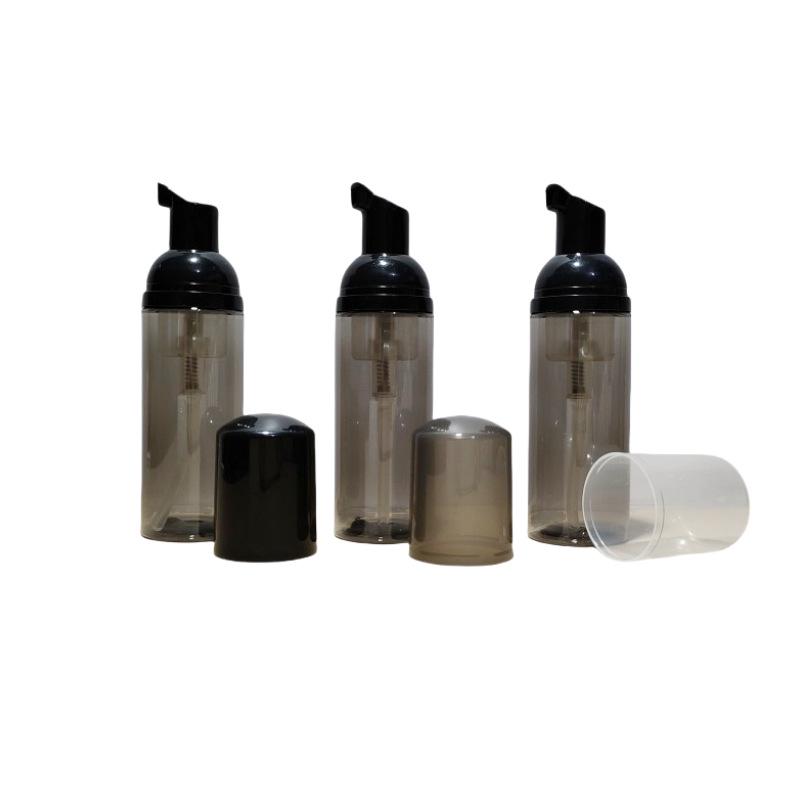 Available 60ml Transparent Black Foam Mousse Bottle for Face Wash and Travel-friendly Cosmetic Packaging.