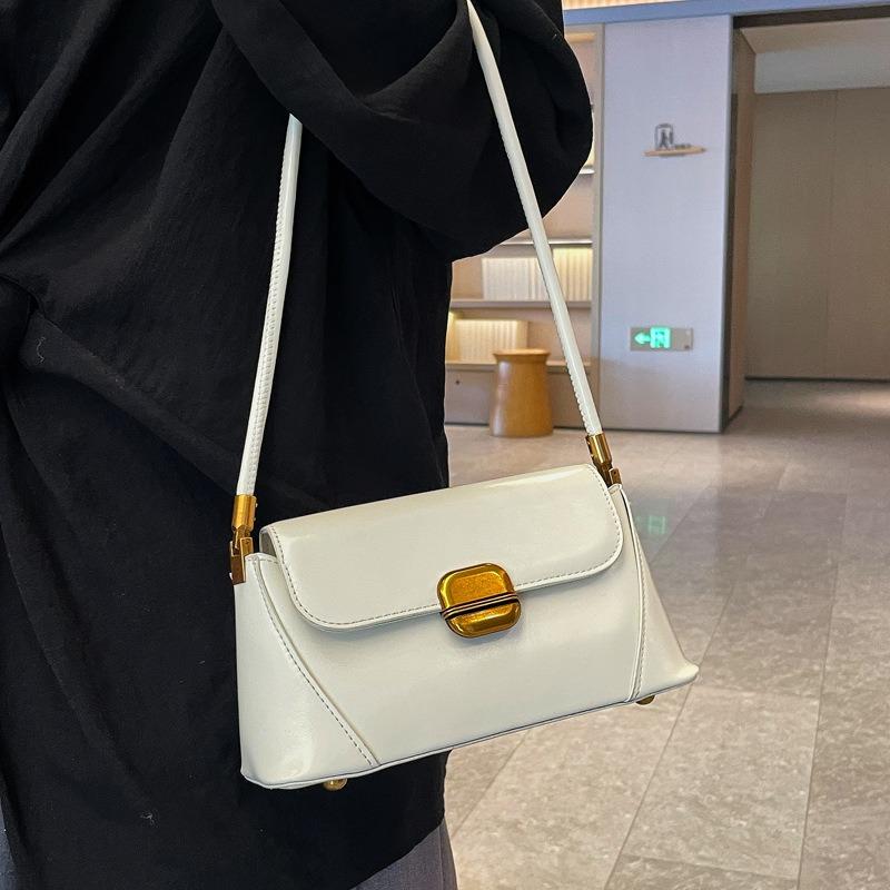 Design sense niche bag women's new high-end texture underarm baguette bag versatile shoulder bag