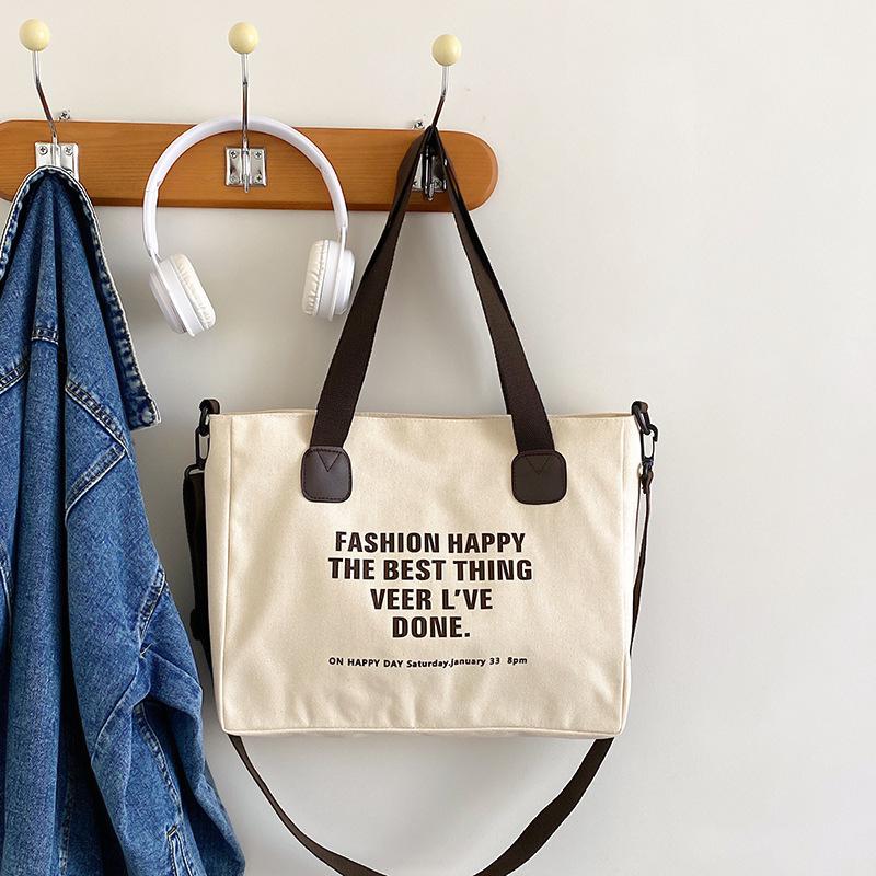 

2025 новая модная простая портативная холщовая сумка большой вместимости для отдыха на плече сумка для покупок для студента колледжа сумка-тоут