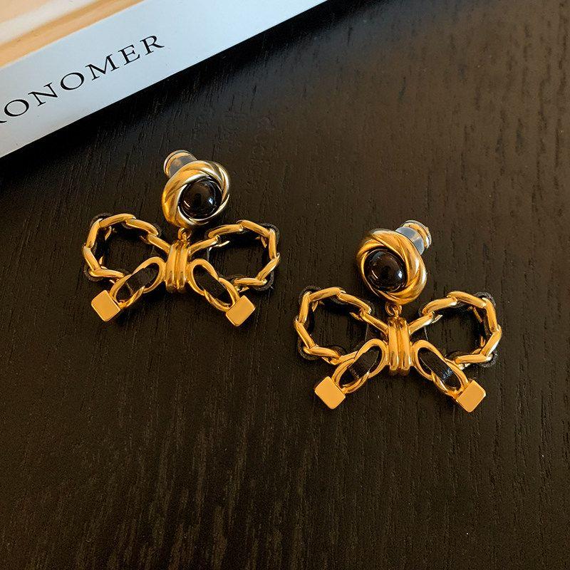 Classic Style Leather Woven Black Gold Female Contrast Color Bow Earrings