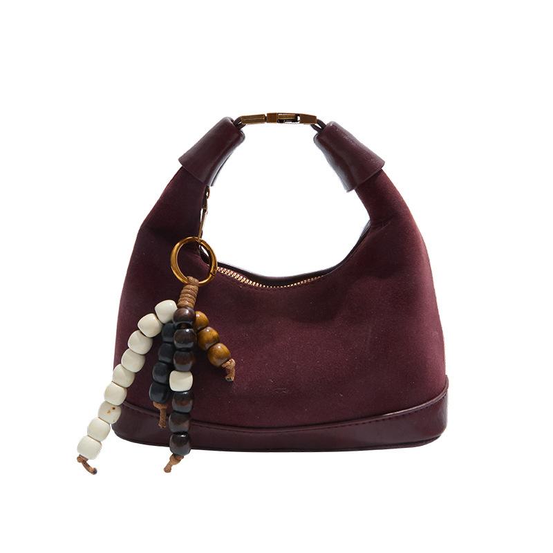 Premium sense niche bag women's autumn and winter 2025 new matte retro messenger bag casual explosion portable dumpling bag