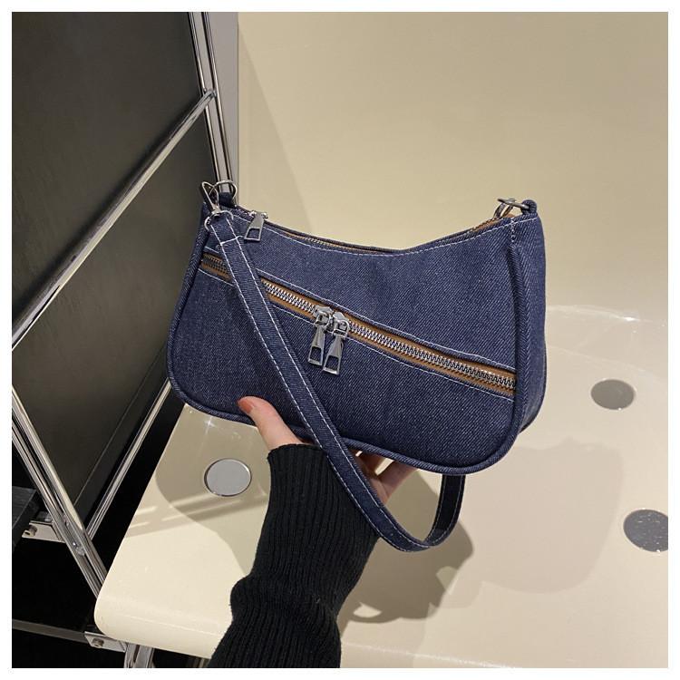 Neue Streetstyle-Umhängetasche aus Canvas für Damen (2024): Modisches Design mit schickem Achselbereich, trendig und vielseitig.